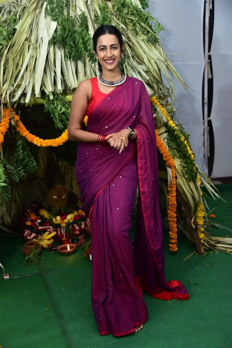 Niharika Konidela Stills in Violet Saree Sleeveless Orange Blouse